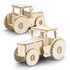 A wooden model of a tractor in natural wood colour, featuring detailed wheels and an open cabin design.