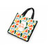A vibrant tote bag featuring a multicoloured abstract pattern with green, orange, and yellow shapes. It has black handles and a logo.