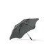 A grey BLUNT Metro Umbrella with a sleek design and a sturdy frame. It features a branding logo.