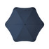 A BLUNT Sport Umbrella in dark blue, featuring a unique star-like shape and a central opening mechanism.