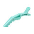 A turquoise alligator clip with an anti-slip grip feature and a textured top for secure holding.