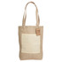 A natural jute shopping bag with a cream-coloured pocket and sturdy handles. It features a tag attached.