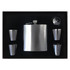 A drink bottle gift set featuring a silver flask, four stainless steel cups, and a pouring funnel in a black box.