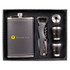 A drink bottle gift set in a black box featuring a stainless steel flask, two shot glasses, a corkscrew, and a bottle opener.