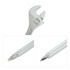 A spanner-shaped ballpoint pen in metallic silver with a shiny finish and detailed design elements.