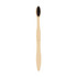 A large toothbrush with a wavy wooden handle and black bristles, featuring a branding logo on the handle.