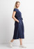 A navy women's midi dress with short sleeves, a belt, and side pockets, paired with white sneakers.