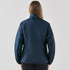 A woman wearing a navy blue thermal jacket, viewed from the back. The jacket features a collar and has a logo.
