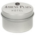 A silver tin candle with a smooth surface, featuring a logo and text for the Athens Plaza Hotel.