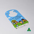 A door hanger featuring a colourful design with children playing outside, set against a blue background and greenery.
