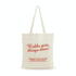 A Calico Tote Bag in cream with red text and a logo. Features sturdy handles for easy carrying.