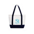 A medium canvas tote bag in cream and navy, featuring a logo on the front and sturdy shoulder straps.