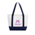 A large canvas tote bag in cream and navy, featuring a logo on the front and sturdy handles.