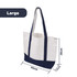 A large canvas tote bag in natural and navy colour, featuring two handles and dimensions of 50cm by 38cm.