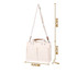 A cream canvas tote bag with adjustable straps, featuring multiple pockets and a sturdy handle for easy carrying.