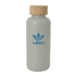 A drink bottle with a matte grey body and a cork lid, featuring a blue logo.