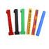 A set of colourful sponge sticks in red, black, green, orange, blue, and yellow, featuring various branding.