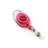 A retractable oval card holder in vibrant pink with a metal clip and clear strap attachment.