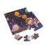 A colourful wooden jigsaw puzzle featuring a space theme with planets and an astronaut, with several loose pieces displayed.