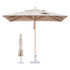 A wind-resistant square outdoor umbrella in beige, featuring a wooden pole and a base stand. It has a logo.