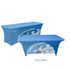 A blue stretch table cover with an open back, featuring graphic designs related to travel. It includes a logo.