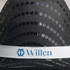 A black sequin cowboy hat with a silver band featuring a logo.