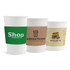 Three white paper cups displayed with different sleeve designs: green, brown, and a graphic featuring food truck elements.