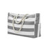 A grey and white striped beach bag with a rope handle and a side pocket. It features a logo on one side.