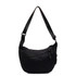 A black crossbody bag with a sleek design and adjustable strap, featuring a side zipper and logo.