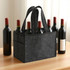 A felt wine tote bag in grey holds several bottles of red wine, with sturdy handles and pockets on the sides.