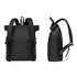 A roll top laptop backpack in black, featuring adjustable straps and a side zipper pocket, with a logo on the surface.