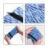 A mini wearable wallet in a blue patterned fabric, featuring a zip closure and easy to fold design.