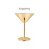 A stainless steel martini goblet in a shiny gold finish, featuring a logo on the base.