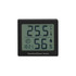 A digital thermometer and hygrometer displaying temperature and humidity. The device has a black casing with a screen.