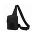 A black tactical sling bag with multiple zippered compartments and an adjustable strap. Features a patch area.