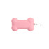 A pink silicone dog poop bag dispenser in a bone shape, featuring a clip for easy attachment.