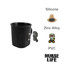 A black ceramic coffee mug featuring a side attachment, with a logo and a silicone grip.