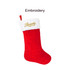 A red Christmas stocking with a white fur cuff and gold embroidery. It features a logo on the cuff.