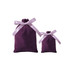 A set of purple velvet drawstring gift bags with matching satin ribbons, in two different sizes.