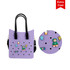 A purple tote bag with black handles, featuring playful embellishments and a logo.