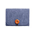A blue felt essential oil bag with a wooden button closure. It features a simple, fold-over design.