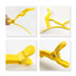 A yellow anti-slip positioning alligator clip with a textured grip and adjustable design, featuring a logo.