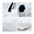 A foldable duffel bag in white with a black and white soccer ball design. Features a zipper and handle.