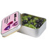 A rectangular silver tin filled with green and black jelly beans, labeled "DEE-Light Party & Wedding Promoters."