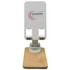 A phone stand featuring a natural bamboo base and a light-colored, textured top with a logo.