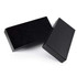 A black gift box set with a sleek exterior. One box features a textured top, while the other has a smooth finish.