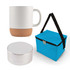 A coffee mug with a cork base, a compact Bluetooth speaker, and a blue insulated carrying bag.