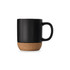 A black coffee mug with a cork base, featuring a sleek design and a comfortable handle.