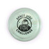 A flying disc featuring a marbled green design with the text "SPACE DISC CHALLENGE" and an illustration of an astronaut.