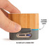 A bamboo Bluetooth speaker featuring a grey base, an SD card slot, a charge port, and flashing coloured lights.